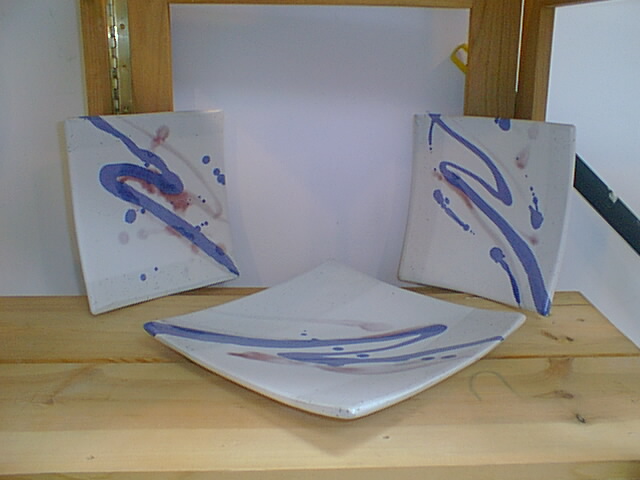Hand-thrown dinnerware with blue brushwork