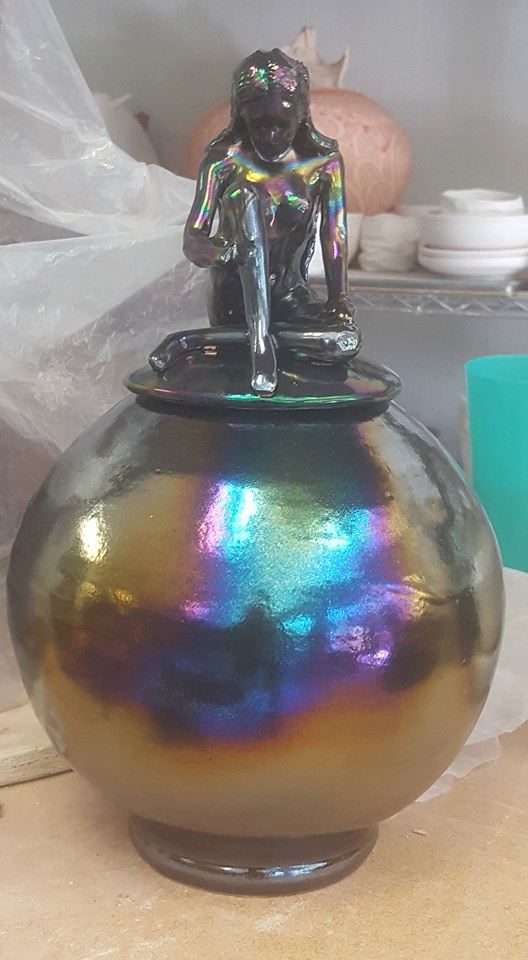 Raku jar with seated figure lid