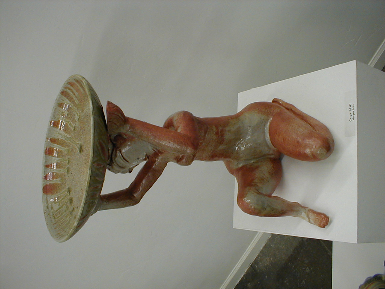 Caryatid #1 — kneeling figure holding bowl
