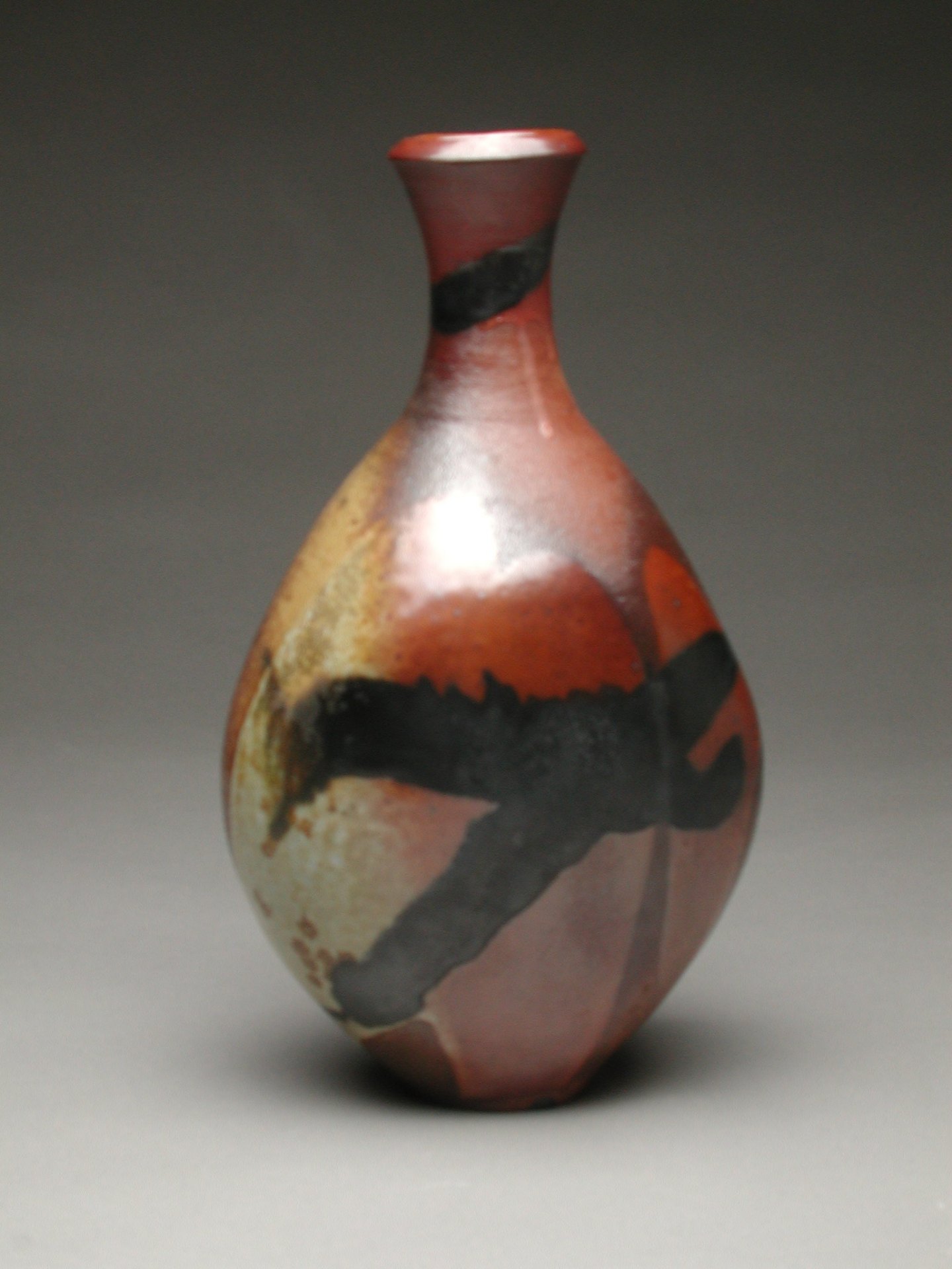 Woodfired bottle with black brushwork