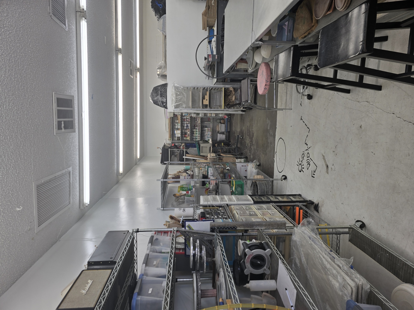 Studio storage and shared worktables for classes and workshops